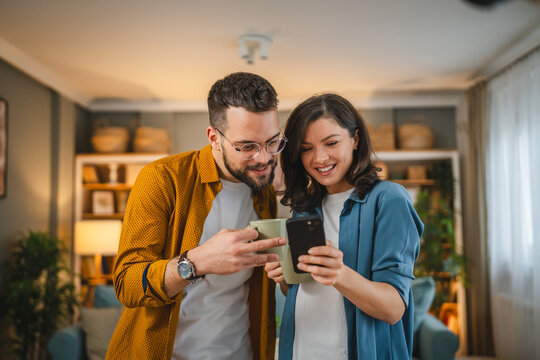 Friends sharing a referral on a phone